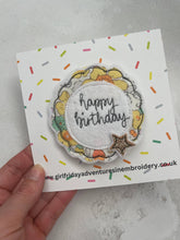 Birthday badge on display backing