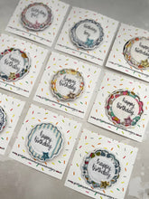 Birthday badge on display backing